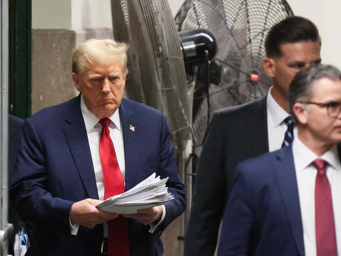 Donald Trump sits in Manhattan Criminal Court for the start of the third week of his trial for allegedly falsifying documents related to hush money payments, in New York City April 30, 2024
