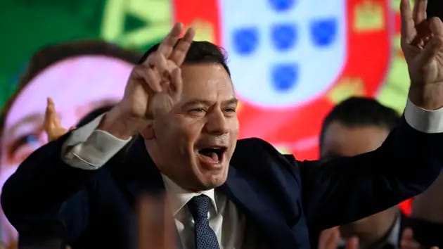 Democratic Alliance (AD) leader Luis Montenegro celebrates his victory as he addresses supporters at the party’s election night headquarters, in Lisbon on March 10, 2024.